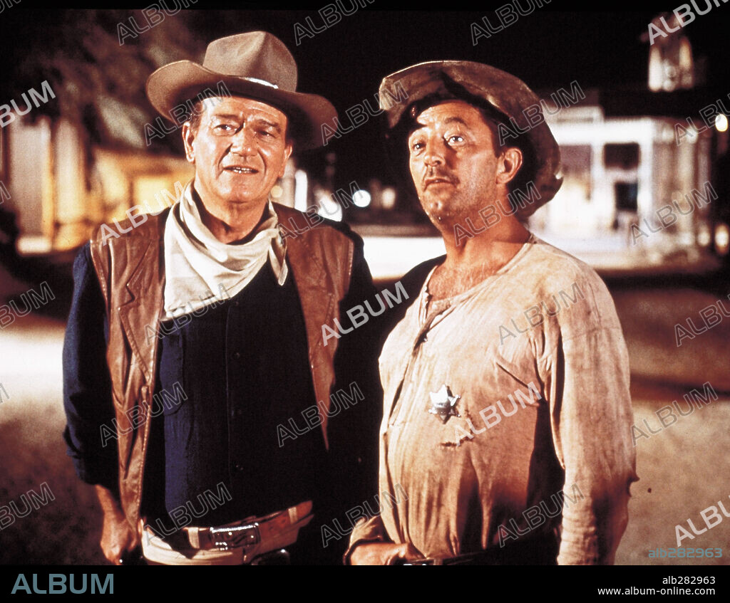 JOHN WAYNE und ROBERT MITCHUM in EL DORADO, 1966, unter der Regie von HOWARD HAWKS. Copyright PARAMOUNT PICTURES.