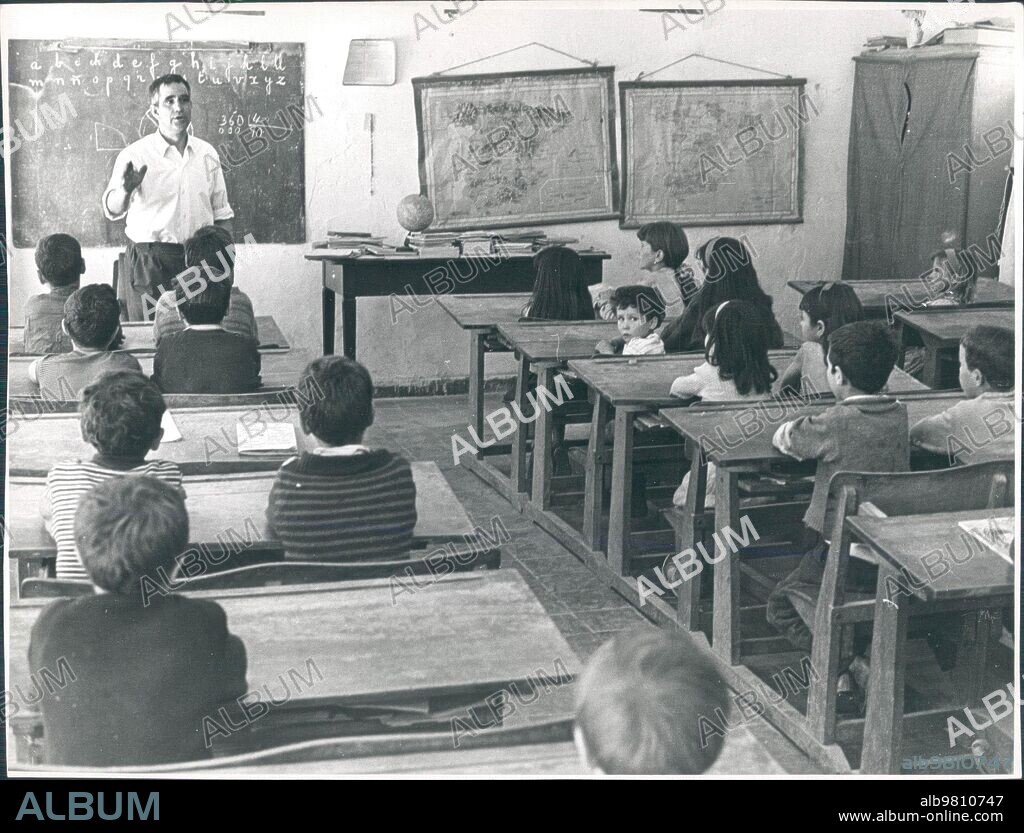 El Gasco (Cáceres), July 1968. The children listen to the explanations of their teacher, Don Esteban García, a relative of Gabriel and Galán, in their classroom in a town in Las Hurdes.