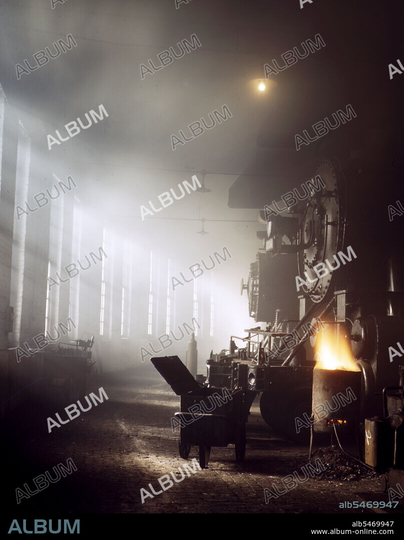 In the roundhouse at a yard of the Chicago and Northwestern [i.e. North Western] railroad, Chicago, Ill. December 1942.