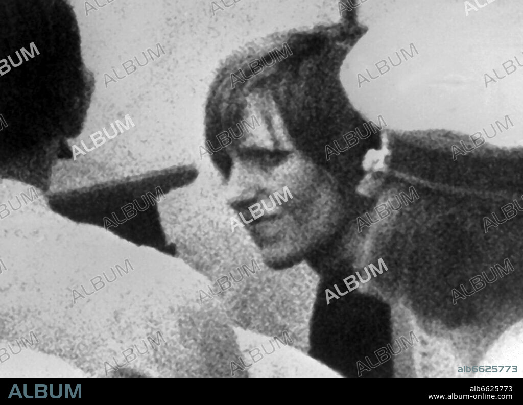 Gudrun Ensslin (m) is taken back to prison during a break in the legal proceedings. Under strict safte precautions, the legal proceedings against Andreas Baader, Ulrike Meinhof, Gudrun Ensslin and Jan-Cal Raspe have startet on the 21st of March in 1975 in Stuttgart-Stammheim. 30/11/1974