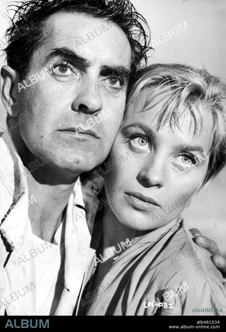 MAI ZETTERLING and TYRONE POWER in SEVEN WAVES AWAY, 1957. Copyright COLUMBIA PICTURES.