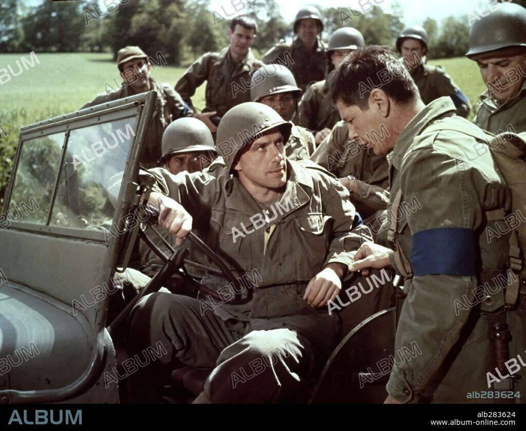 CHARLES BRONSON and JOHN CASSAVETES in THE DIRTY DOZEN, 1967, directed by ROBERT ALDRICH. Copyright M.G.M.