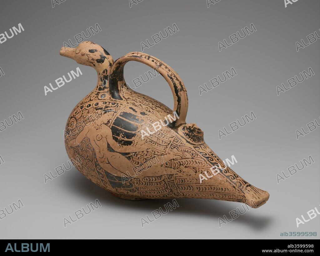 Terracotta duck-askos (flask with spout and handle). Culture: Etruscan. Dimensions: H. 5 5/8 in. (14.3 cm). Date: ca. 350-325 B.C..
This Etruscan pottery style is associated with workshops active in Chiusi and Volterra during the second half of the fourth century B.C. In addition to the duck's body and wings with carefully rendered feathers, each side is decorated with a floating nude female holding a ribbon. On some related pieces, these figures are winged and have often been identified as Etruscan lasas, nymph-like characters frequently depicted on engraved mirrors and pottery. The precise function of duck-askoi has been hotly debated. Many seem too large to have been used for expensive scented oils and instead may have contained lamp oil or olive oil. Because some earlier duck-askoi have been found with a special type of barrel-shaped vase, some scholars have suggested a connection with wine.