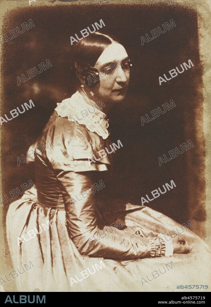 Elizabeth Rigby, later Lady Eastlake (1809-1893), c. 1844-1845. Among the earliest photographers to explore both the artistic and societal possibilities of the portrait were the painter David Octavius Hill and engineer Robert Adamson, partners for just three years before Adamson?s death. Elizabeth Rigby , seen here at age 35, went on to marry Sir Charles Eastlake and, in 1857, to write one of the first histories of photography as a fine art. James Nasmyth, an engineer who developed the steam hammer, holds a compass. Hill and Adamson often shot outdoors because bright sunlight allowed shorter exposure times. They subordinated the background in shadow and bathed the important details of the face and finery in areas of light.