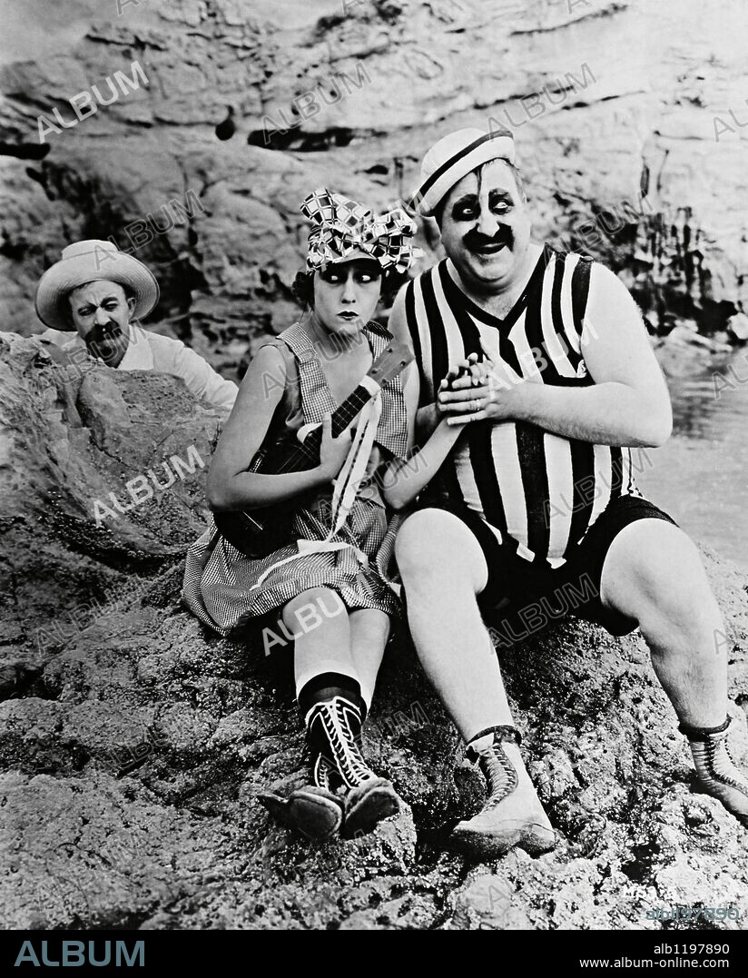 GLORIA SWANSON and MACK SWAIN.