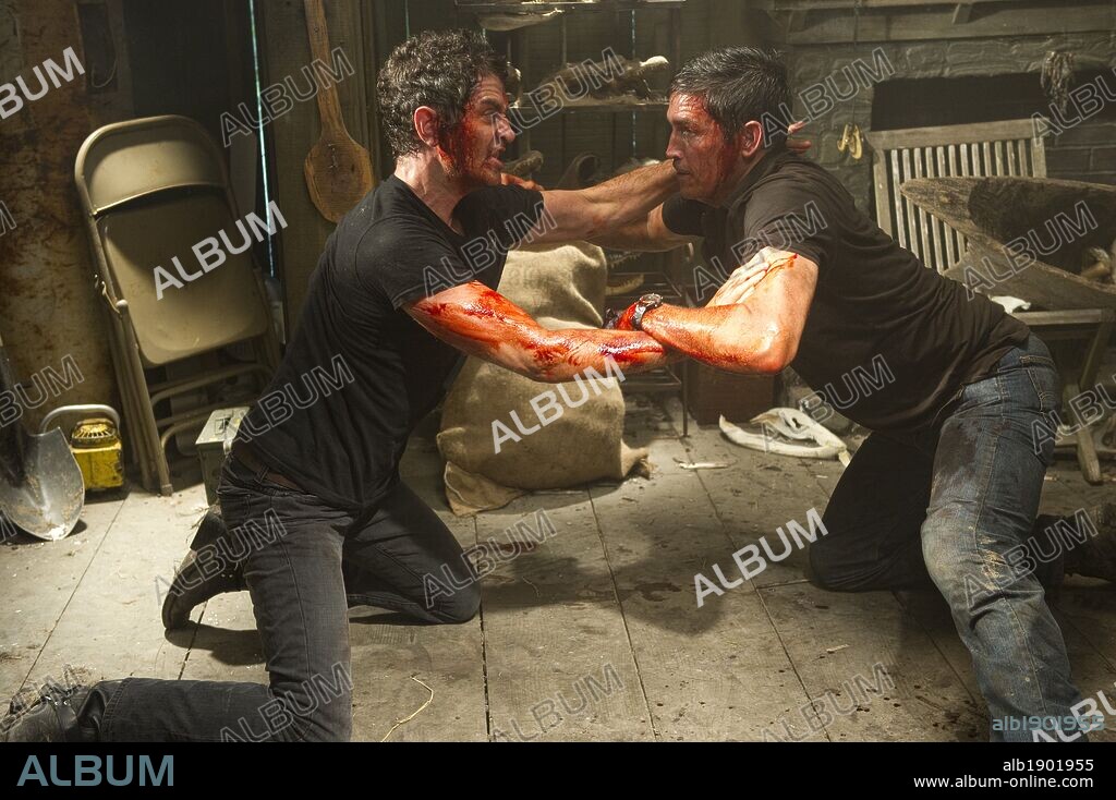 JAMES FRAIN and JIM CAVIEZEL in TRANSIT, 2012, directed by ANTONIO NEGRET. Copyright AFTER DARK FILMS.