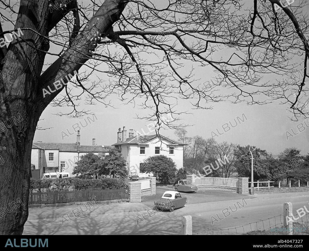 Two Bond disabled cars outside the CISWO paraplegic centre, Pontefract, West Yorkshire, 1960. CISWO is the Coal Industry Social Welfare Organisation. Some of the residents of the centre were miners who had met with an accident at work.