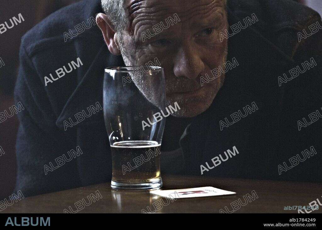 PETER MULLAN in TYRANNOSAUR, 2011, directed by PADDY CONSIDINE. Copyright INFLAMMABLE FILMS.