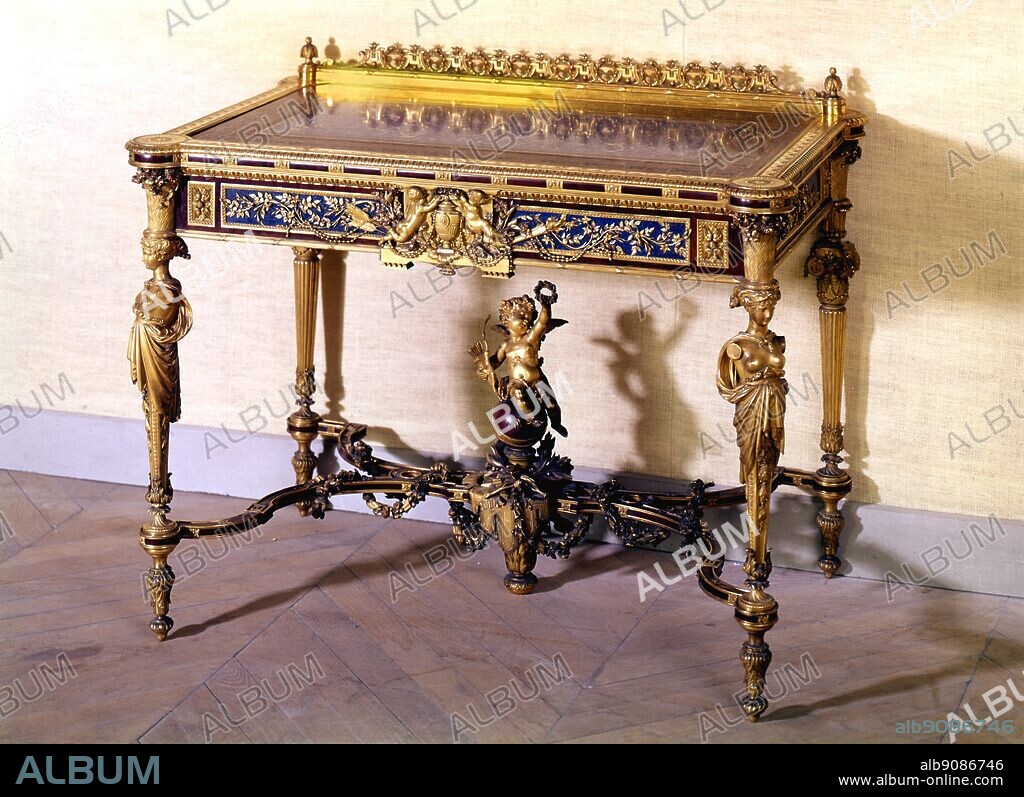 Second Empire Furniture. Lady's Bureau in lapis, red marble and bronze gilt.. Inscription 'P. Christofleet H Bouilhet, or orfeure, E. Reiber designer, Paris, 1867, carrier Belleuse et J.Cheret Sculpt.'. For 1867 Exhibition.. Musee des Art Decoratifs.