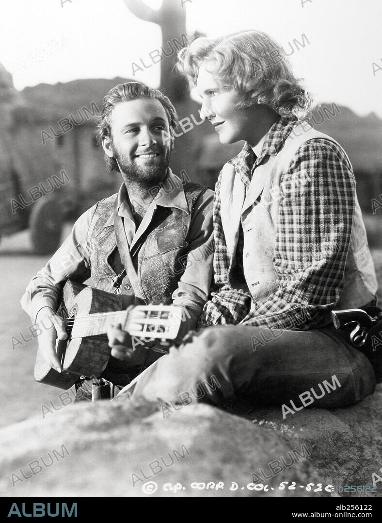 JEAN ARTHUR and WILLIAM HOLDEN in ARIZONA, 1940, directed by WESLEY RUGGLES. Copyright COLUMBIA PICTURES.