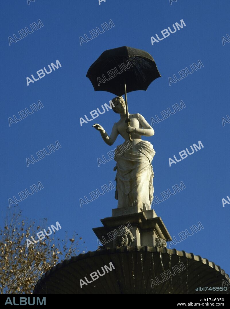Joan Roig Soler (1852-1909). Spanish sculptor. The lady of the umbrella, (1884). Citadel Park. Barcelona. Catalonia. Spain.