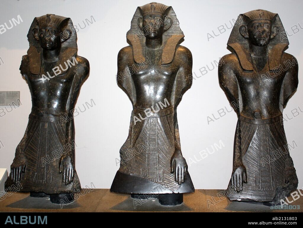 Three Egyptian statues of King Sesostris III (Also known as Senusret III). Twelfth Dynasty (approx. 1850 BC) from Deir el Bahri. Made from black granite. (Photo by: Universal History Archive/UIG via Getty Images).