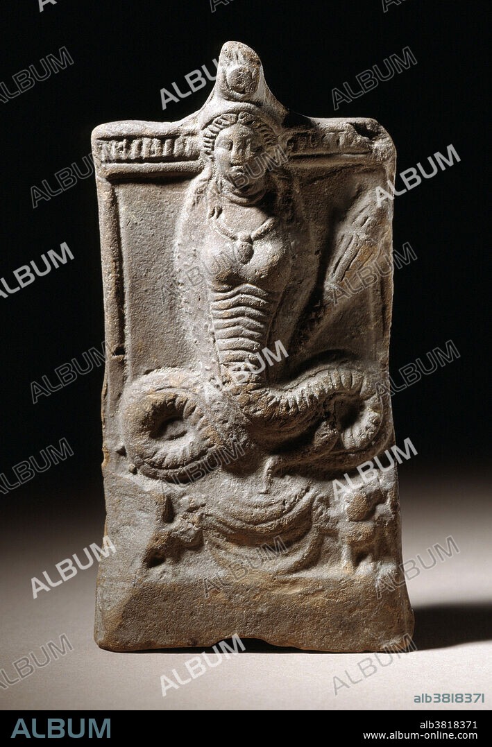 Terracotta sculpture of Isis with Serpent Tail, Egypt, 2nd century AD. Isis is a goddess in Ancient Egyptian religious beliefs, whose worship spread throughout the Greco-Roman world. She was worshipped as the ideal mother and wife as well as the patroness of nature and magic. She was the friend of slaves, sinners, artisans, and the downtrodden, and she listened to the prayers of the wealthy, maidens, aristocrats, and rulers. Isis is also known as protector of the dead and goddess of children. Isis was a fertility goddess, the sister and wife of Osiris, mother of Horus, sister of Set, and Nephthys, and daughter of Geb and Nut. She searched for her husband's body, retrieved and reassembled Osiris, taking on the role of goddess of the dead. She was sometimes equated with the snake goddess Renenutet, a goddess of harvest.