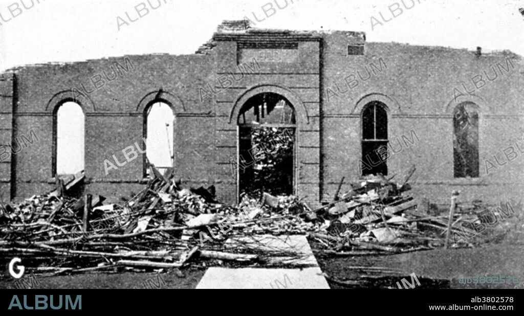 The Great Tri-State Tornado of Wednesday, March 18, 1925, was the deadliest tornado in US history. With 695 fatalities, the tornado killed more than twice as many as the second deadliest, the 1840 Great Natchez Tornado. The continuous 219 mile track left by the tornado was the longest ever recorded in the world: the tornado crossed from southeastern Missouri, through southern Illinois, then into southwestern Indiana. Although not officially rated by NOAA, it is recognized by most experts as an F5 tornado, the maximal damage rating issued on the Fujita scale. There has been uncertainty as to whether the event was one continuous tornado or a tornado family. Ongoing new research, however, finds no break in the path and also that the tornado touchdown may have occurred approximately 15 miles farther west than previously thought, bringing the total path length to around 234 miles. Photo originally captioned: "Ruins of the De Soto, Illinois, public school where 33 children were killed. The storm hit the school at about 2:45 p.m. A casualty of the Tri-State Tornado, the longest-lived and longest path of any recorded tornado. It traveled over 300 miles from SE Missouri to Indiana and killed over 600.".