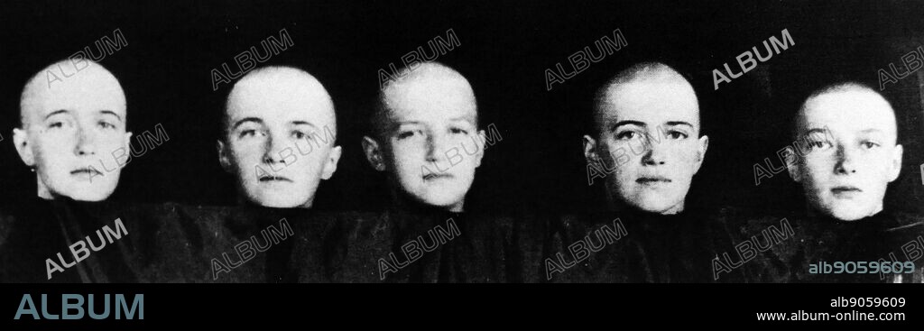 Photographic portrait of the Romanov children, shaved, after contracting the measles. (from left) Grand Duchess Anastasia Nikolaevna of Russia (1901-1918), Grand Duchess Olga Nikolaevna of Russia (1895-1918), Alexei Nikolaevich, Tsarevich of Russia (1904-1918), Grand Duchess Maria Nikolaevna of Russia (1899-1918) and Grand Duchess Tatiana Nikolaevna of Russia (1897-1918). Dated 20th Century.