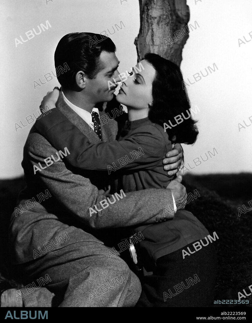 CLARK GABLE and HEDY LAMARR in COMRADE X, 1940, directed by KING VIDOR. Copyright M.G.M.