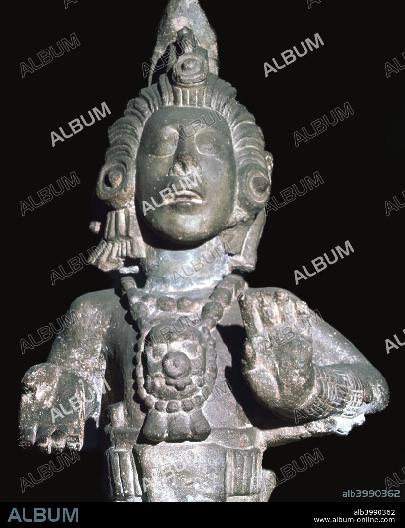 Stone bust of the Maize God, Maya, Copán, Honduras, Late Classic period, c600-c800. This sculpture is one of eight that were once set on the cornice of Structure 22, comissioned by Waxaklajuun Ub'aah K'awiil (also known as 18-Rabbit), the thirteenth ruler of Copán. It was built in 715 to commemorate the twentieth anniversary of his accession to the throne. The Maize God, with his vibrant, youthful features, represents the Maya ideal of beauty, and features prominently in Maya art during the Classic period (200 BC - AD 900). From the British Museum's collection.
