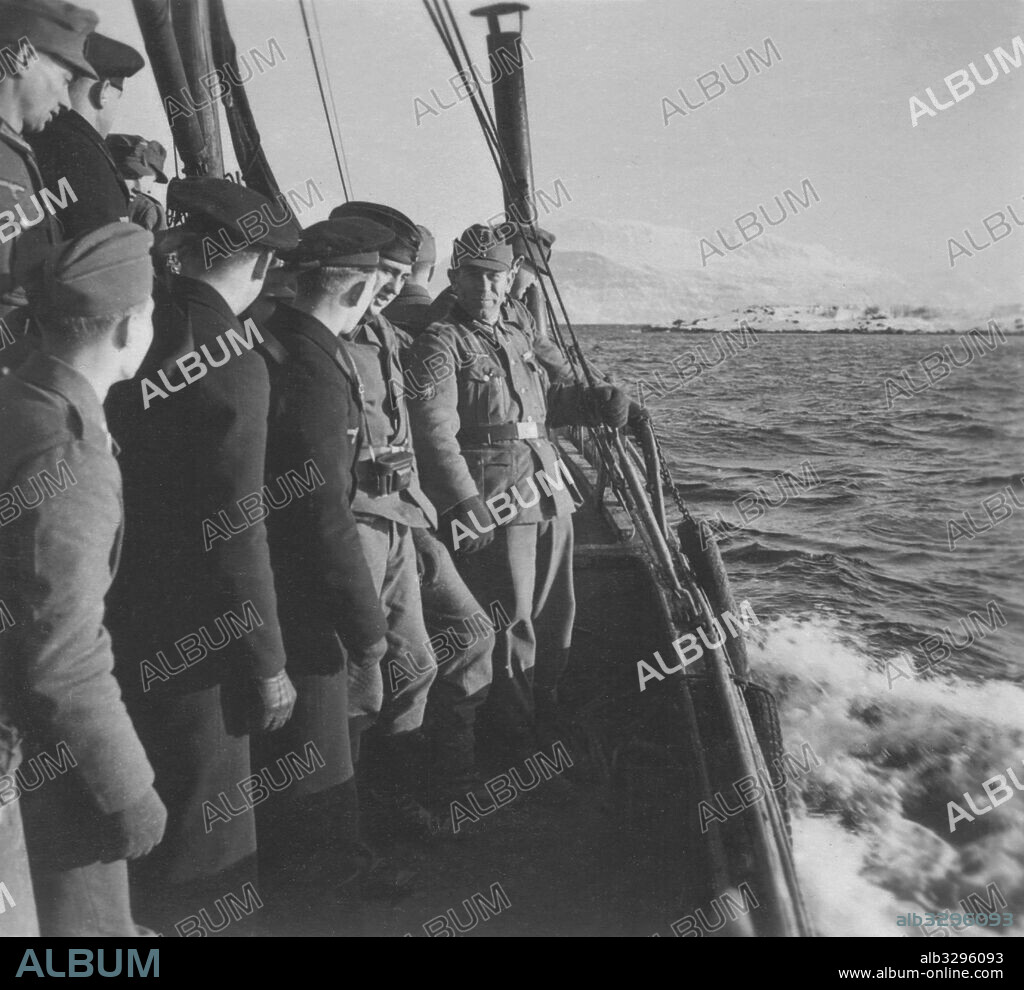 Narvik – Sailors and mountain troops on a ferry crossing the Narvik fjord.