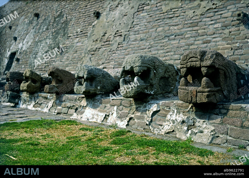 Tenayuca Pyramid, Aztec construction, the below part of the wall has snake heads surrounding the entire base of the structure.    .