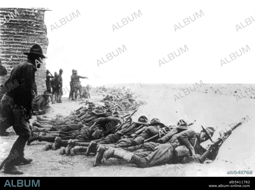 American soldiers at the Mexican border in prone firing position. The Pancho Villa Expedition was a military operation conducted by the US Army against the forces of Mexican revolutionary Pancho Villa from March 1916 - February 1917, during the Mexican Revolution of 1910-20. The expedition was launched in retaliation for Villa's attack on the town of Columbus, New Mexico. Despite successfully locating and defeating the main body of Villa's command, responsible for the raid on Columbus, US forces were unable to achieve Wilson's stated main objective of preventing Villa's escape. Underwood & Underwood, May 24, 1916.