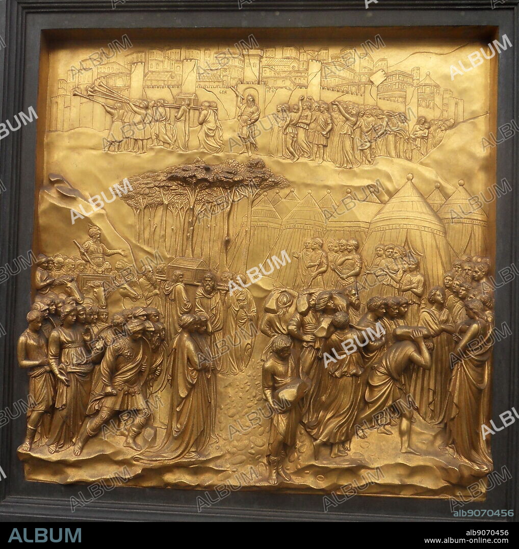 Detail from the Battistero di San Giovanni (Florence Baptistery). The baptistery Considered a minor basilica, and is a religious building in Florence, Italy. It is in the Florentine Romanesque style, and was built between 1059 and 1128, making it one of the oldest buildings in the city. 3 sets of bronze doors with relief sculptures are on the exterior. The south doors created by Andrea Pisano, and the east and north doors by Lorenzo Ghiberti. This panel is a depiction of 'The fall of Jericho'.