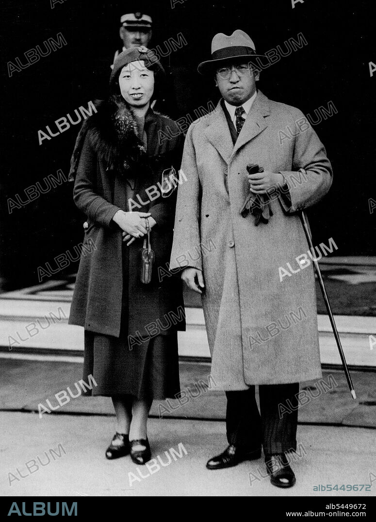 Japanese Royalty In Edinburgh -- Prince Tsunenori Kaya, cousin of the Emperor of Japan, with his wife, Princess Toshiko, photographed on their arrival in Princess Street Edinburgh, from London. They are on a tour of Scotland. May 13, 1934. (Photo by Topical Press).