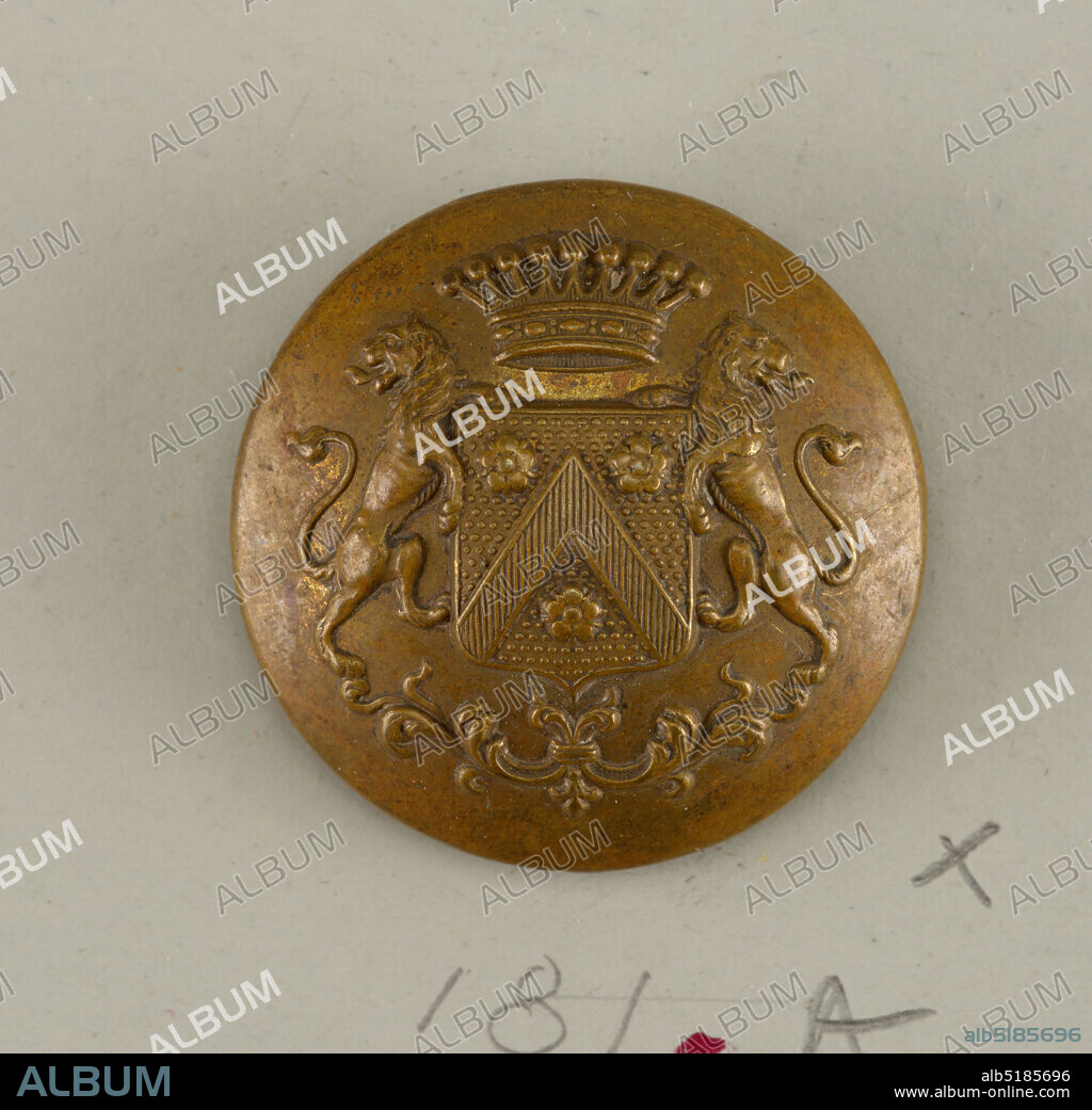Button, brass, convex button with ornament of a shield with heraldic devices, lion supporters standing on leaf scrolls and, at top, a crown - brass back and shank - on reverse, 'Carette and Philipponnat Paris.', On card H, France, 19th century, costume & accessories, Decorative Arts, Button.