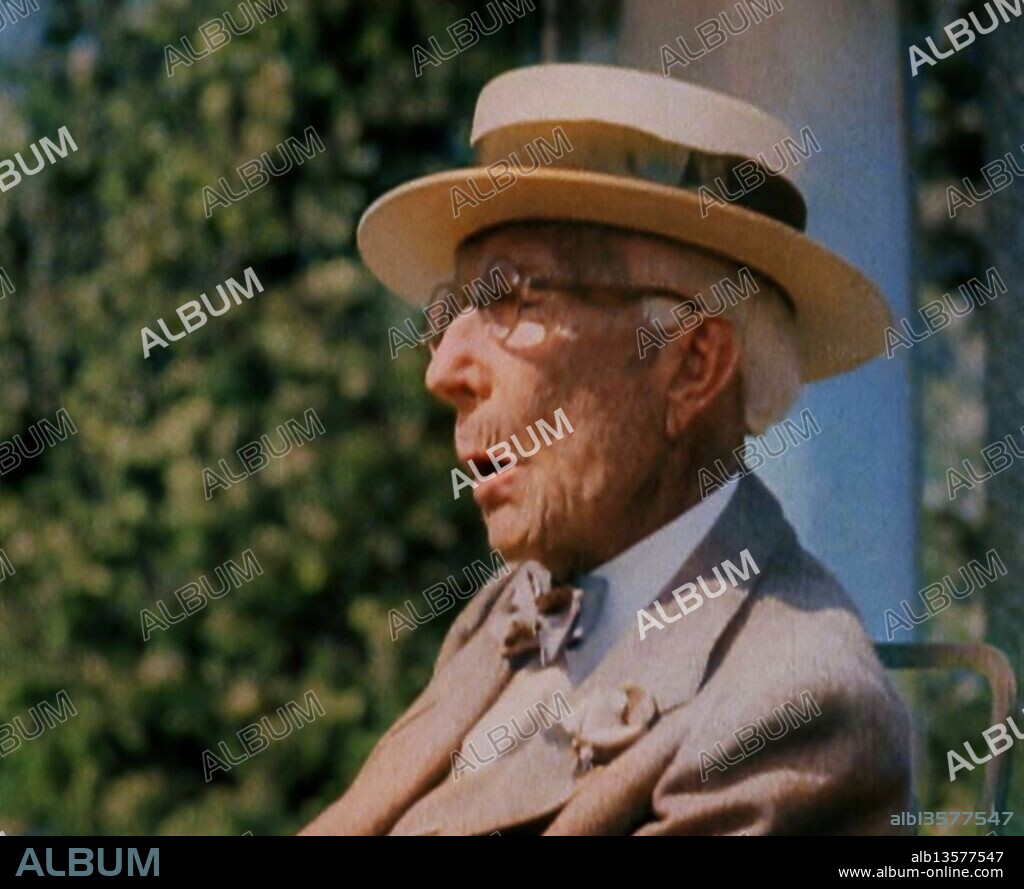 John D. Rockefeller Talking, 1930s. From "Time To Remember -  Some People in the Thirties", 1930s (Reel 3); documentary film about the 1930s, focussing on famous characters of the time. (Colorised black and white still).