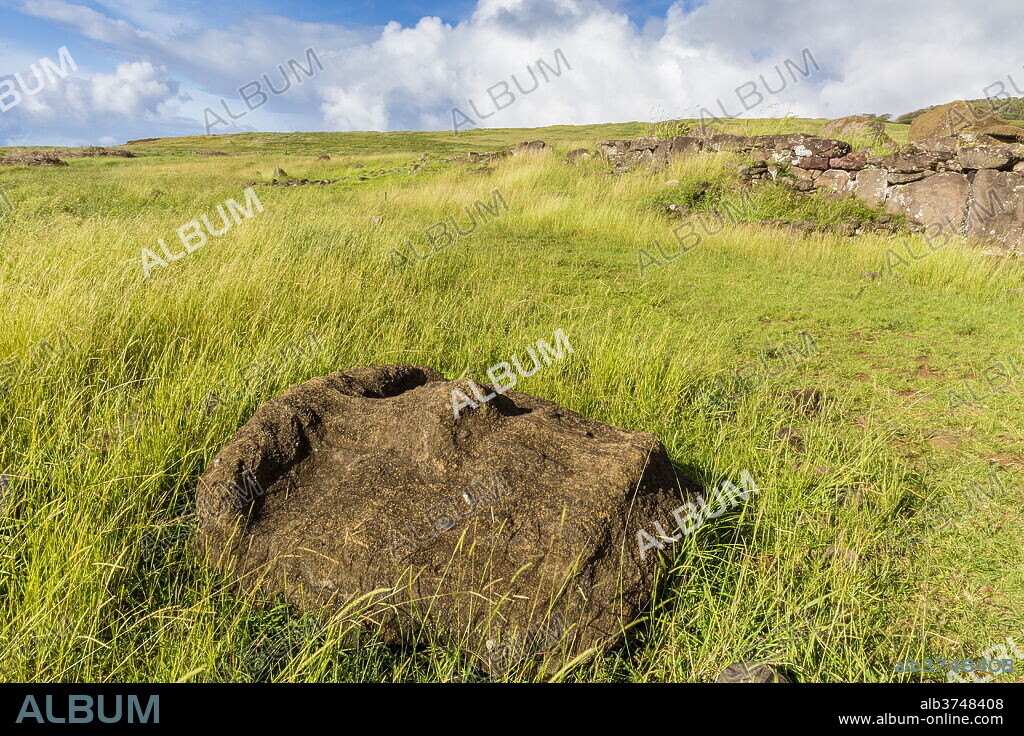 Fallen moai head at the archaeological site at Ahu Vinapu, Rapa Nui National Park, UNESCO World Heritage Site, Easter Island (Isla de Pascua), Chile, South America.