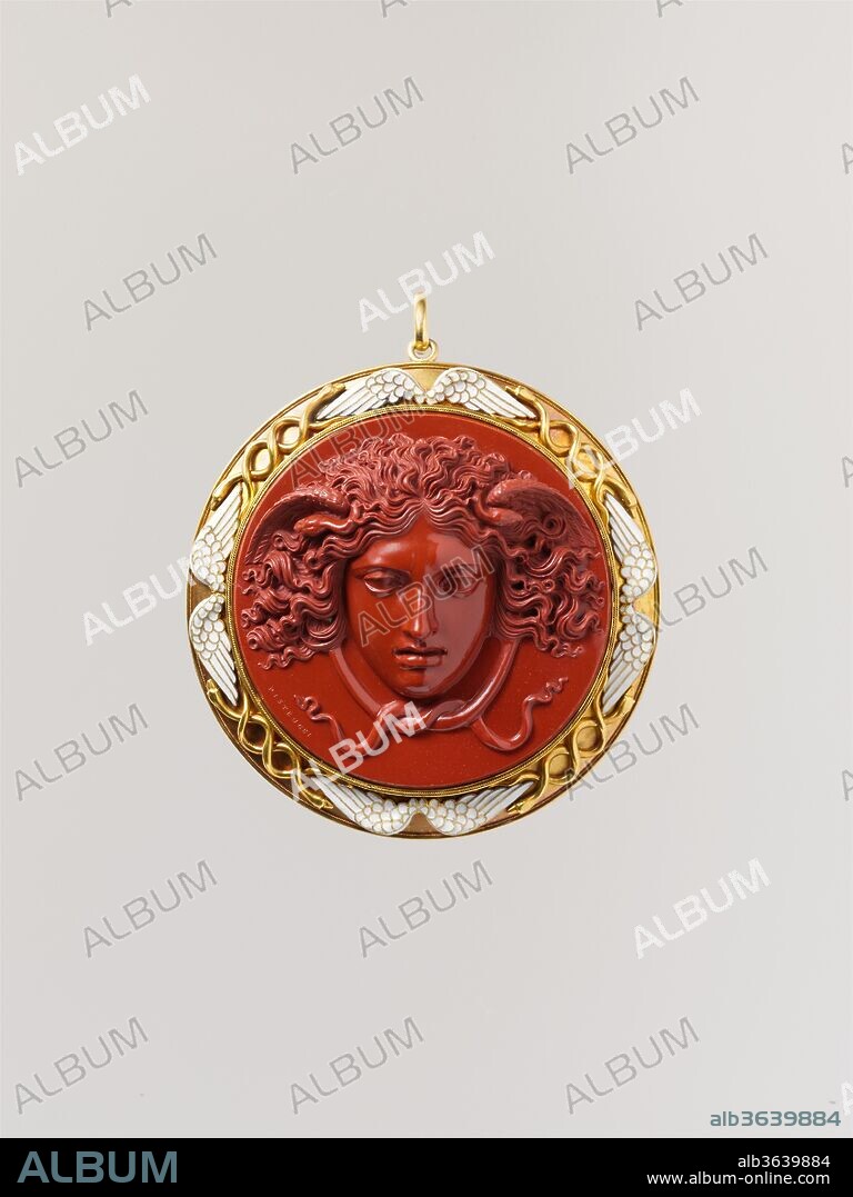 Head of Medusa. Artist: Cameo by Benedetto Pistrucci (Italian, 1783-1855, active England). Culture: Italian, executed in England (London). Dimensions: Overall (isible cameo): 2 1/8 in. (5.3 cm), 53.2 mm;
Overall (in setting): 2 11/16 x 2 11/16 in. (6.8 x 6.8 cm). Maker: Mount by Carlo Giuliano (Italian, active England, ca. 1831-1895). Date: cameo 1840-50, mount ca. 1860.
One of the most elegant of all Medusas, this head borrows freely from the ancient marble mask known as the Rondanini Medusa in the Glyptothek, Munich. The cameo was commissioned from Benedetto Pistrucci for the impressive sum of 200 guineas by a London dentist and collector, Samuel Cartwright, who also ordered a marble bust of himself (National Portrait Gallery, London). The wings and snakes on the cameo's frame allude to the caduceus of Mercury, emblem of the medical profession. The existence of a silver copy of the Medusa head bearing the mark of the silversmith Carlo Giuliano (sold at Sotheby's in New York in 2006) proves that he was the author of the strikingly handsome mount.