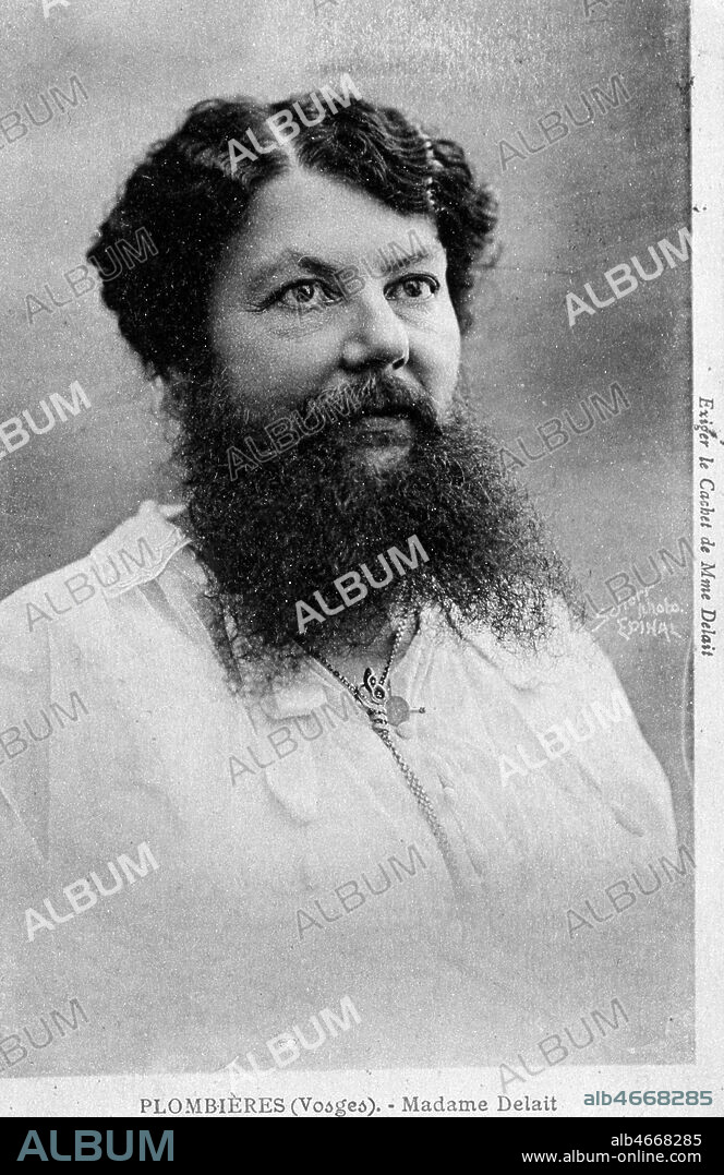 Femme a barbe se produisant dans les cirques et foires 'Madame Clementine Delait a Plombieres (Vosges)'. Carte postale vers 1905. Credit: Cheuva / KHARBINE-TAPABOR.