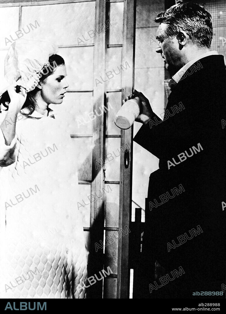 CARY GRANT and SAMANTHA EGGAR in WALK DON'T RUN, 1966, directed by CHARLES WALTERS. Copyright COLUMBIA PICTURES.