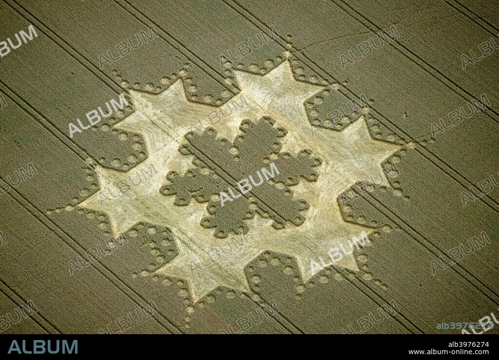 'Snowflake' crop circle near Alton Barnes, Wiltshire, 1997. Some people regard crop circles as evidence of UFO contact or spiritual activity. Others believe they are hoaxes.