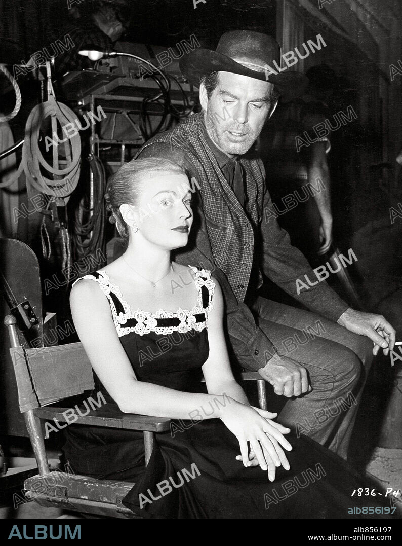 FRED MACMURRAY y JUNE HAVER en LOS MALDITOS DE QUANTEZ, 1957 (QUANTEZ). Copyright UNIVERSAL INTERNATIONAL.