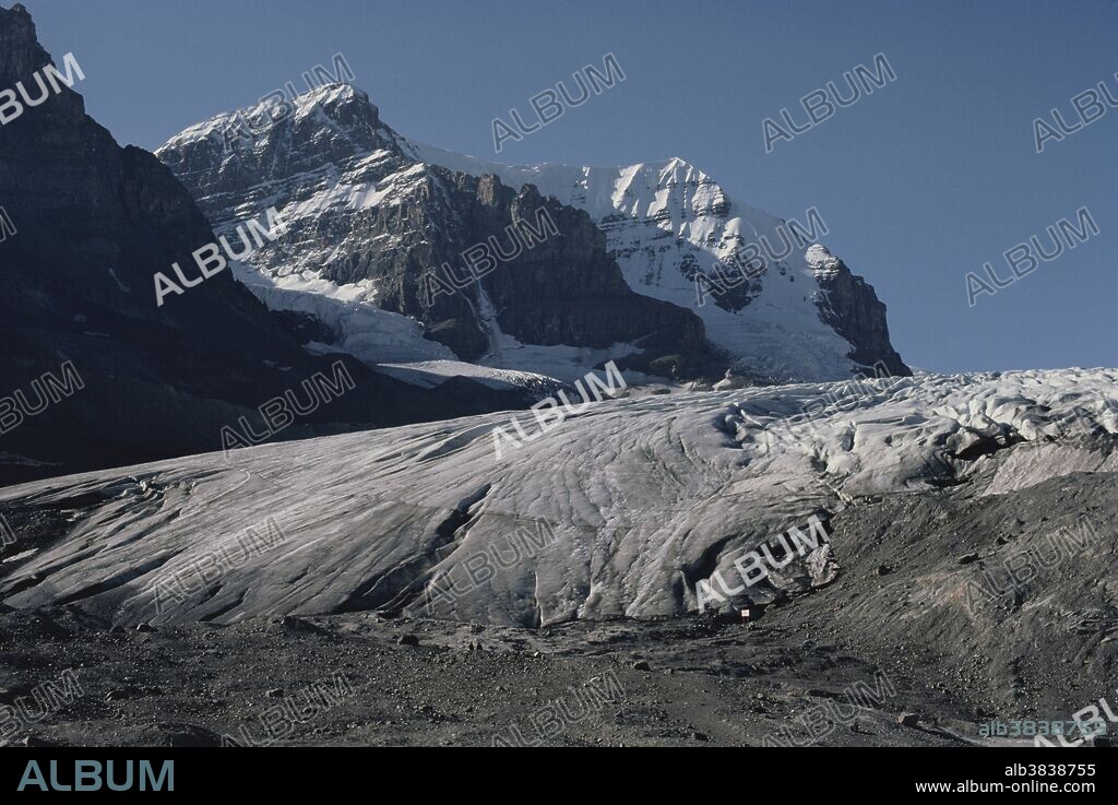 Athabasca Glacier, part of the Columbia Icefield, as seen from the east in Jasper National Park, Alberta, Canada, in the early 1970s.  In the background is Mt. Athabasca (11,100').