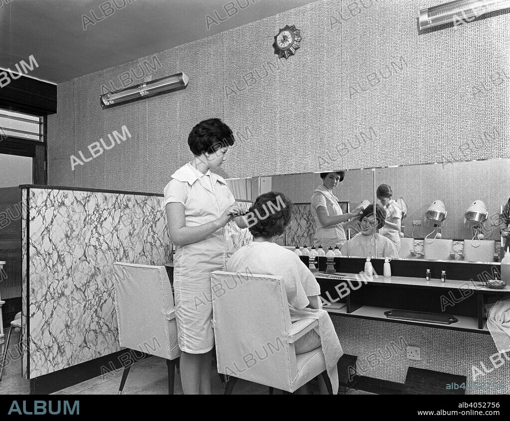 Hairdressers' salon, Armthorpe, near Doncaster, South Yorkshire, 1961. The photograph was commissioned by the company who manufactured the Formica wipe down surfaces, which were a familier sight in the 1960s and 1970s.