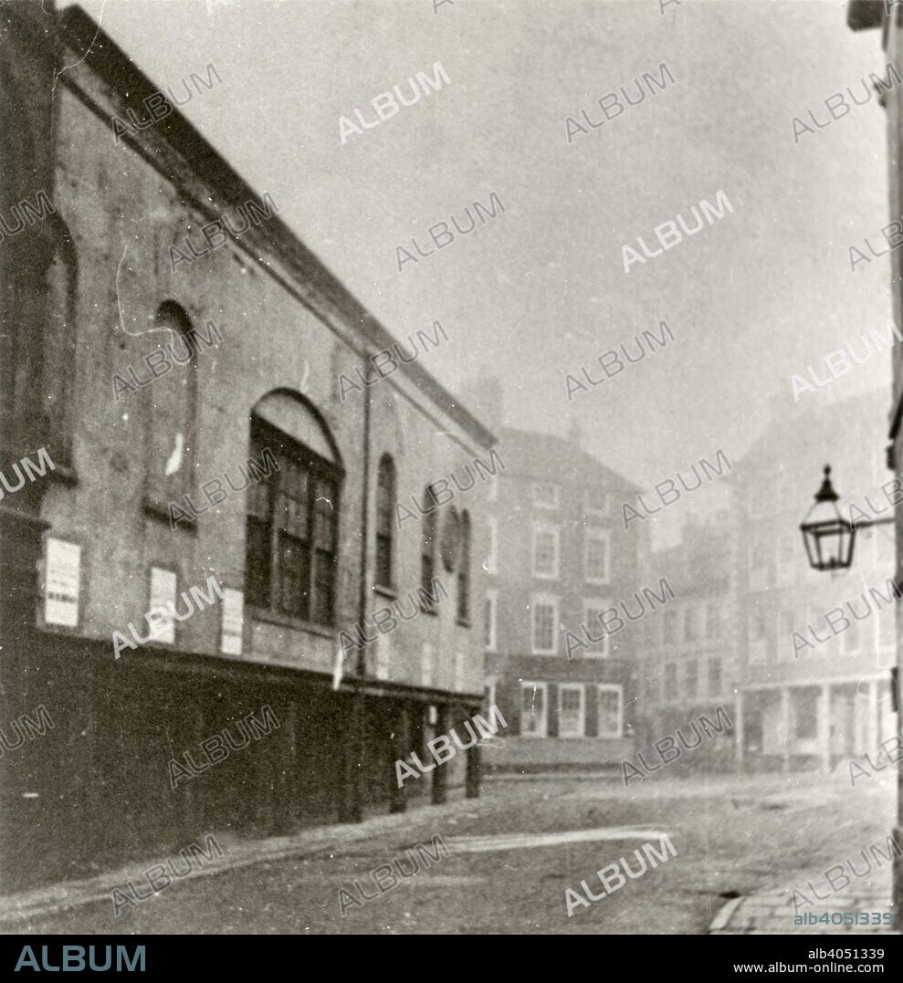 Old Town Hall, Weekday Cross, Lace Market, Nottingham, Nottinghamshire, 1896. The Old Town Hall (Guildhall) on the left which was sold in 1894 and demolished in 1896 to make way for the Great Central Railway. The view is looking towards Carlton Street.