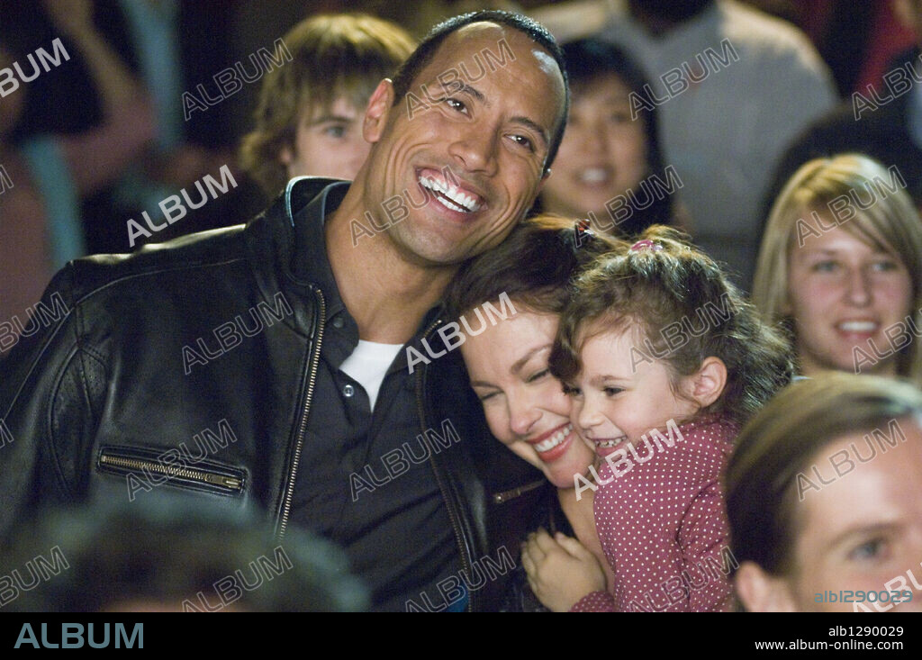 ASHLEY JUDD and DWAYNE "THE ROCK" JOHNSON in TOOTH FAIRY, 2010, directed by MICHAEL LEMBECK. Copyright TWENTIETH CENTURY-FOX FILM CORPORATION/DAVID ENTERTAINMENT.