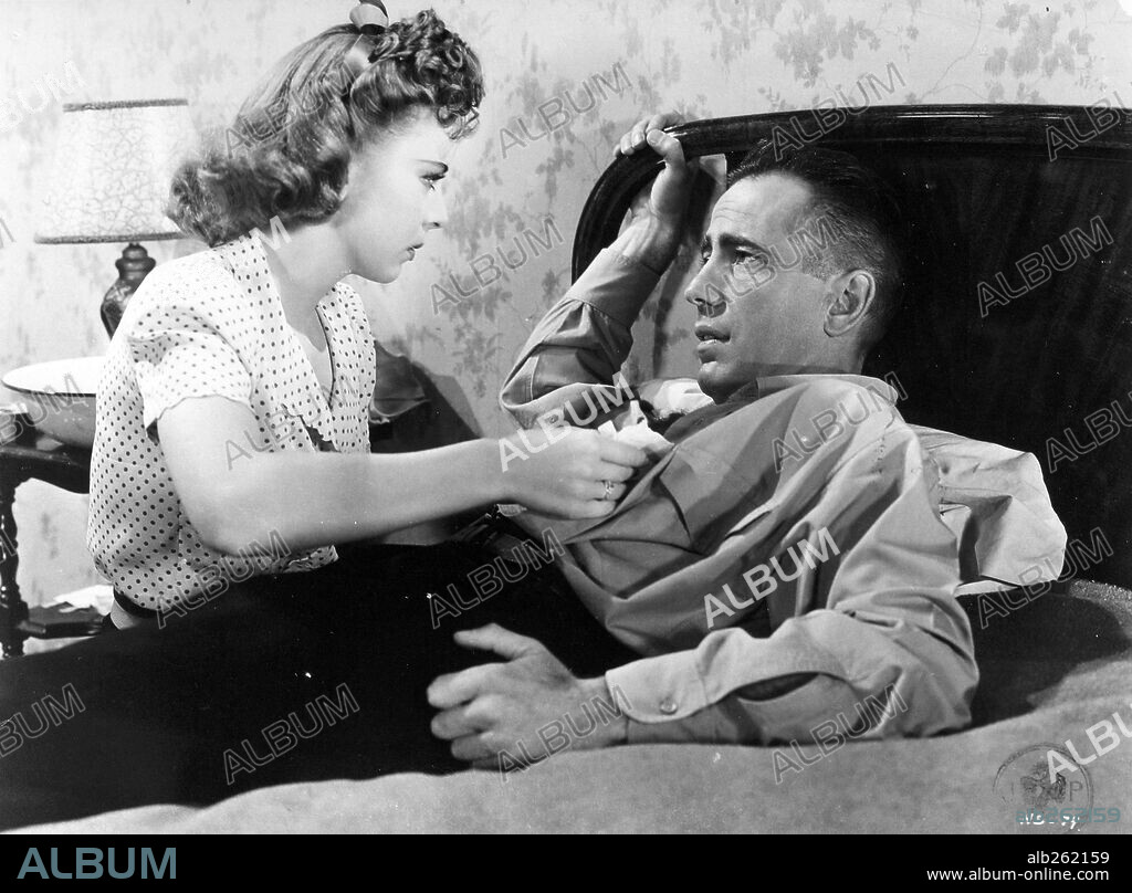HUMPHREY BOGART und IDA LUPINO in HIGH SIERRA, 1941, unter der Regie von RAOUL WALSH. Copyright WARNER BROS/FIRST NATIONAL.