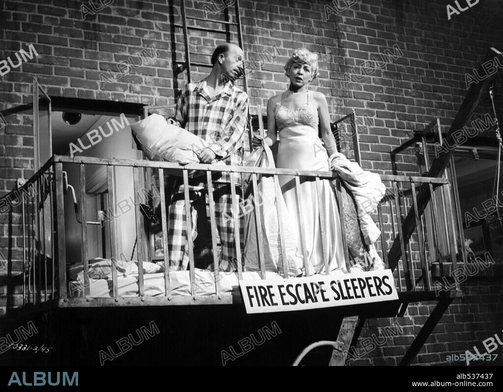 FRANK CADY and SARA BERNER in REAR WINDOW, 1954, directed by ALFRED HITCHCOCK. Copyright PARAMOUNT PICTURES.