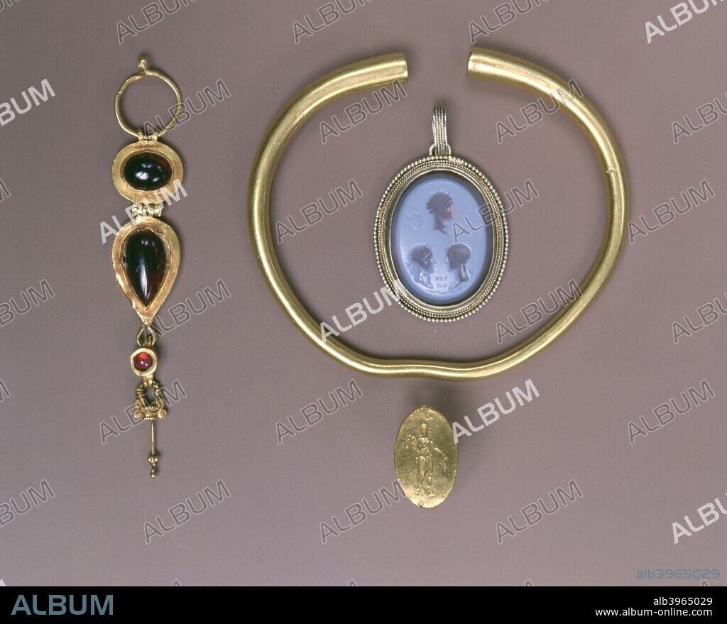 Assorted Greek and Roman jewelry, 4th century BC-17th century. Greek gold ring, 4th century BC, Gold bracelet, Parthian, 2nd century AD, golden earing, Roman, 3-4th century, 17th century Intaglio pendant. Private Collection.