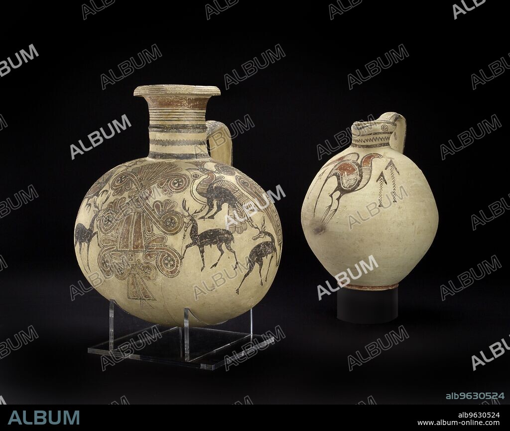 Bichrome IV barrel-shaped Cypro-Phoenician jug, Cypro-Archaic I Period, c750 - c600BC. Phoenician vase with sacred tree, stags, crested birds, and lotus flowers. Dimension: height: 28.5 cm width: 27.9 cmdepth: front to back (where handle is) 22.3 cm.