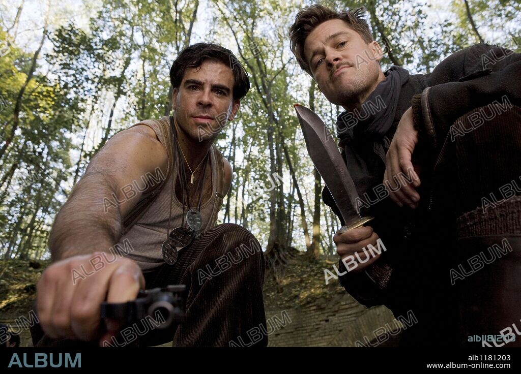 BRAD PITT and ELI ROTH in INGLOURIOUS BASTERDS, 2009, directed by QUENTIN TARANTINO. RELEASE DATE: August 21, 2009. MOVIE TITLE: Inglourious Basterds. STUDIO: Universal Pictures. PLOT: In Nazi-occupied France during World War II, a group of Jewish-American soldiers known as ''The Basterds'' are chosen specifically to spread fear throughout the Third Reich by scalping and brutally killing Nazis. The Basterds soon cross paths with a French-Jewish teenage girl who runs a movie theater in Paris which is targeted by the soldiers. PICTURED: ELI ROTH as Sgt. Donnie Donowitz and BRAD PITT as Lt. Aldo Raine.
