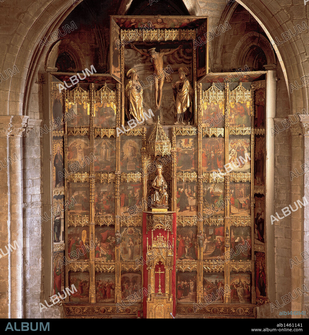 RENAISSANCE ART. SPAIN. CHURCH OF SAINT MARY. Altarpiece. Painting transition from Gothic to Renaissance (1515) attributed to the Aragonese Pedro de Aponte. In the center a carving of the Virgin and Child (XIV c.) and above it, a Calvary of the sixteenth century. Olote. Navarre.