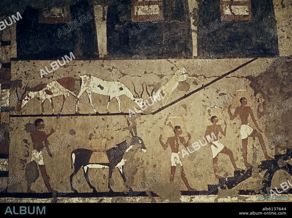 TRANSPORTE DE GRANO EN LOS SILOS - PINTURA PARIETAL DE UNA TUMBA.
