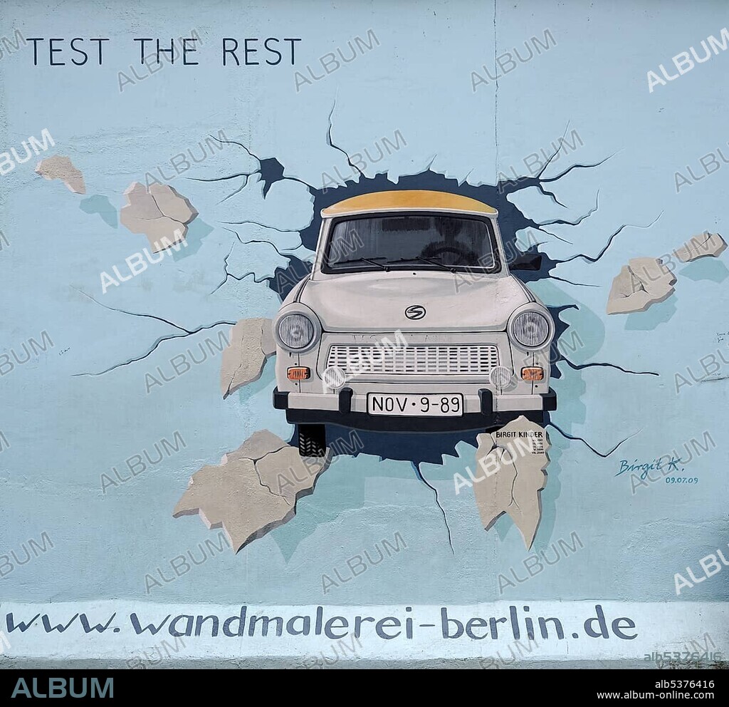 Birgit Kinder, Test the Rest, Trabant breaking through the Berlin Wall, by Birgit Kinder, painting on the Berlin Wall, East Side Gallery, Berlin, Germany, Europe.