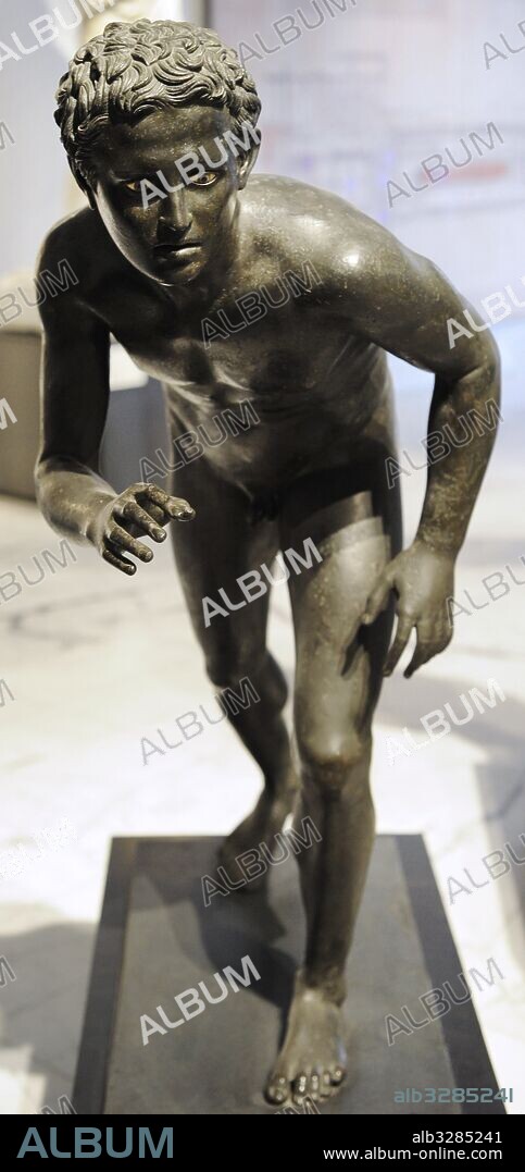 Statue of a runner. 1st century AD. Bronze. Probably a Roman copy of a Greek original from the 4th-3rd centuries BC. Great peristyle. Villa of the Papyri, Herculaneum. National Archaeological Museum. Naples. Italy.