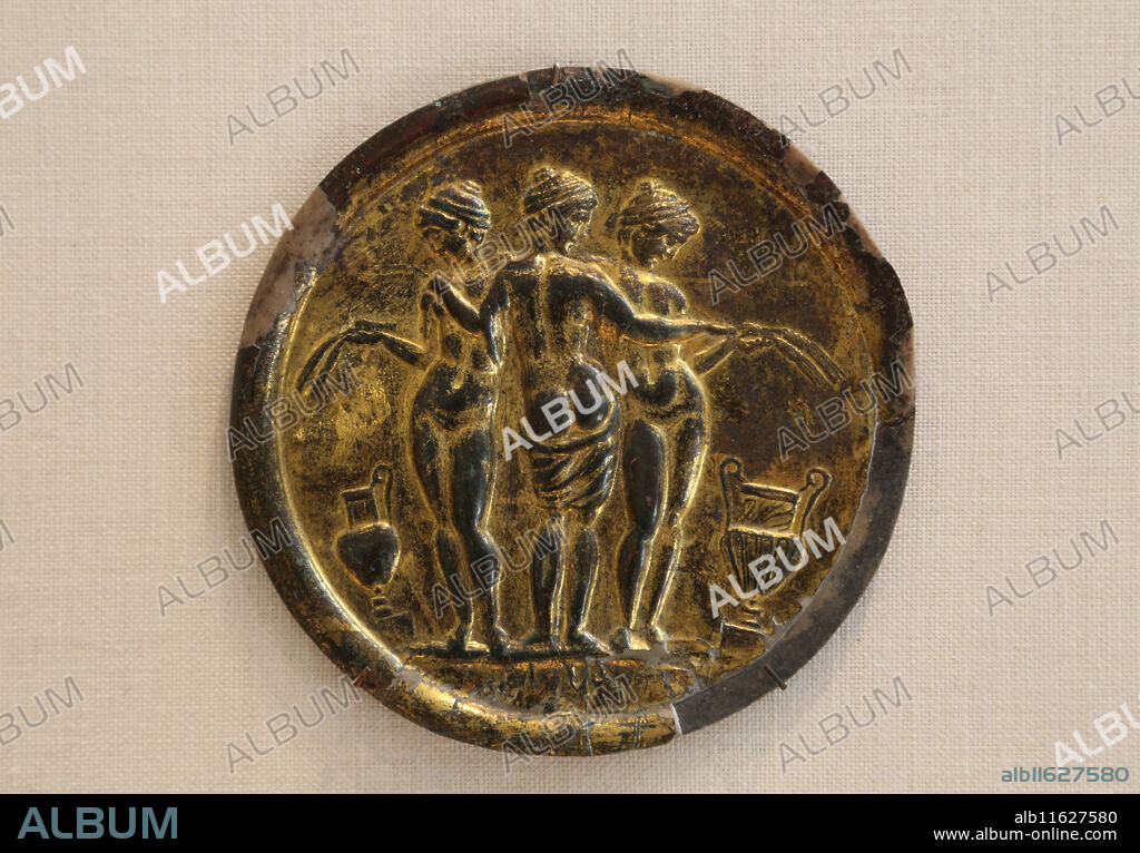Gilded bronze mirror with the Three Graces. Roman, mid-2nd c. AD. Metropolitan Museum. NY. USA.