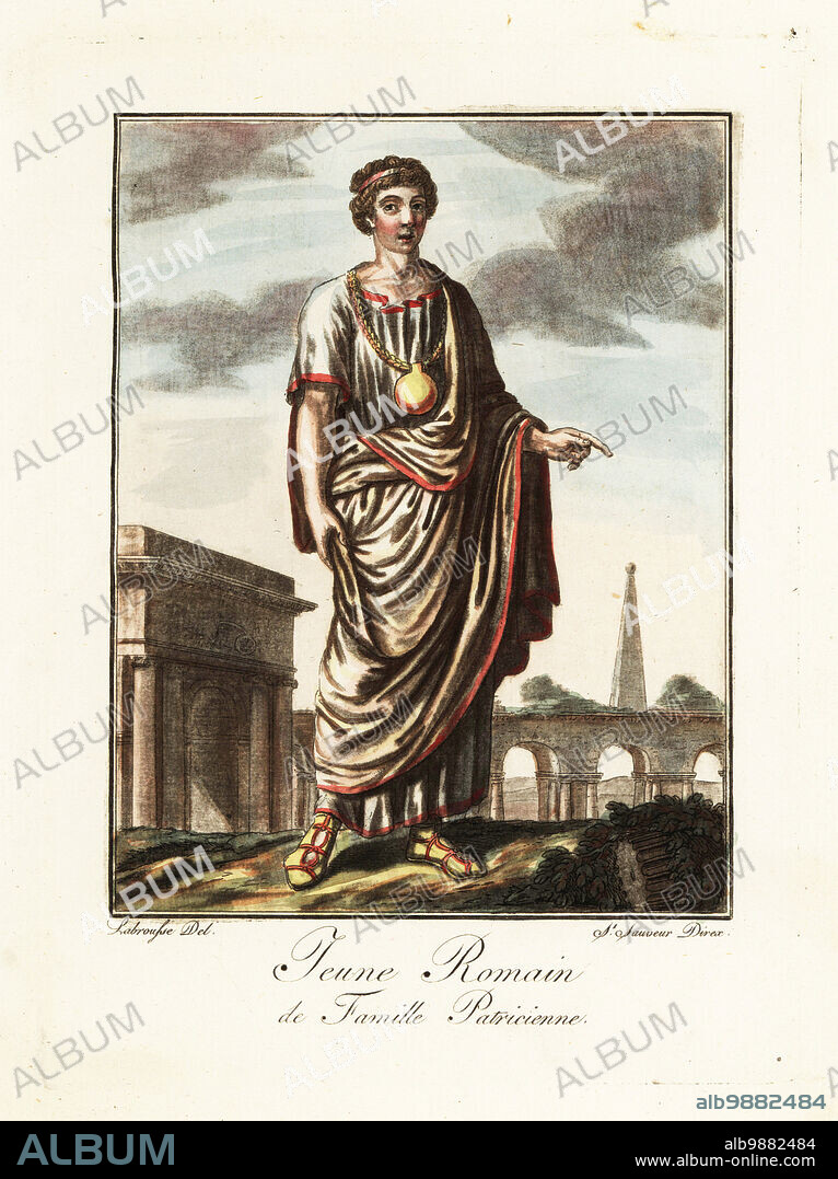 Young man from a Patrician family ancient Rome. In a robe called a toga virilis or libera with gold bulla hanging around his neck yellow and red sandals. In front of an