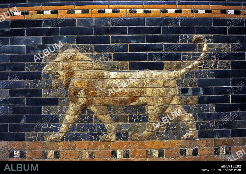 Mesopotamian art. Neo-Babylonian. The Throne Room of  Nebuchadnezzar II. Reconstructed facade. Dated in 580 B.C. Its 56 meters facade was decorated with colored glazed bricks as shows the composition, including stylized palms. The frieze of lions was presumably arranged symmetrically so that the animals faced toward the central main entrance to the trone-room. Detail. Lion. Pergamon Museum. Berlin. Germany.